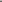 Öja, Stockholms skärgård. Röda och gula trähus av blandad ålder och storlek. Längst bort fyren Landsorts vita torn och utsikt mot Östersjön..